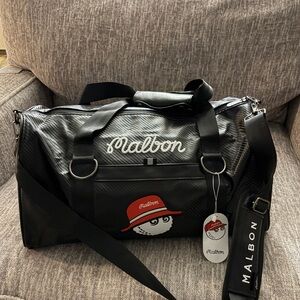 Malbon Black Travel Bag w/Shoulder Strap, Shoe Compartment and multiple pockets.